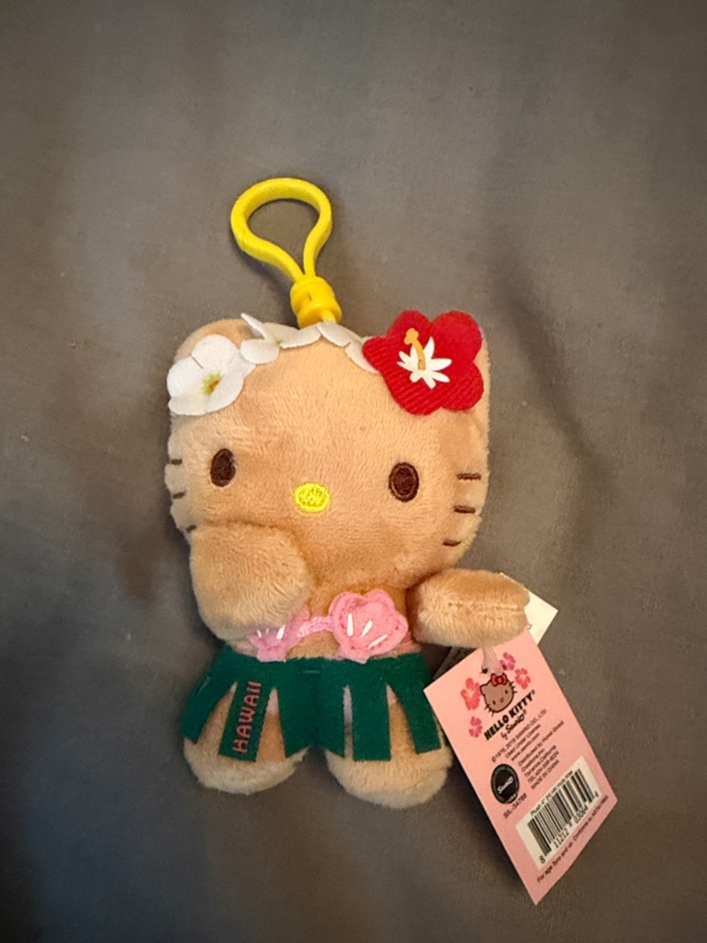 Hello Kitty Tan Plush Keychain with Green Skirt and Red Flower